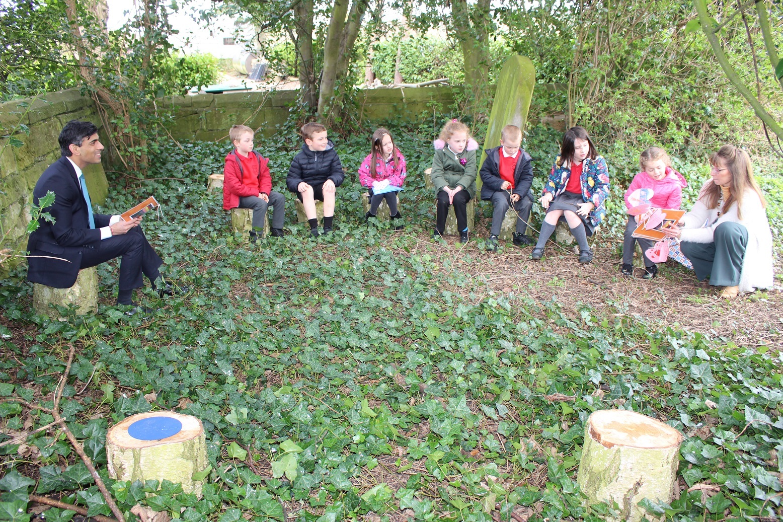 Rishi Sunak with the children in the outdoor classroom in the churchyard at All Saints’, Great Ayton