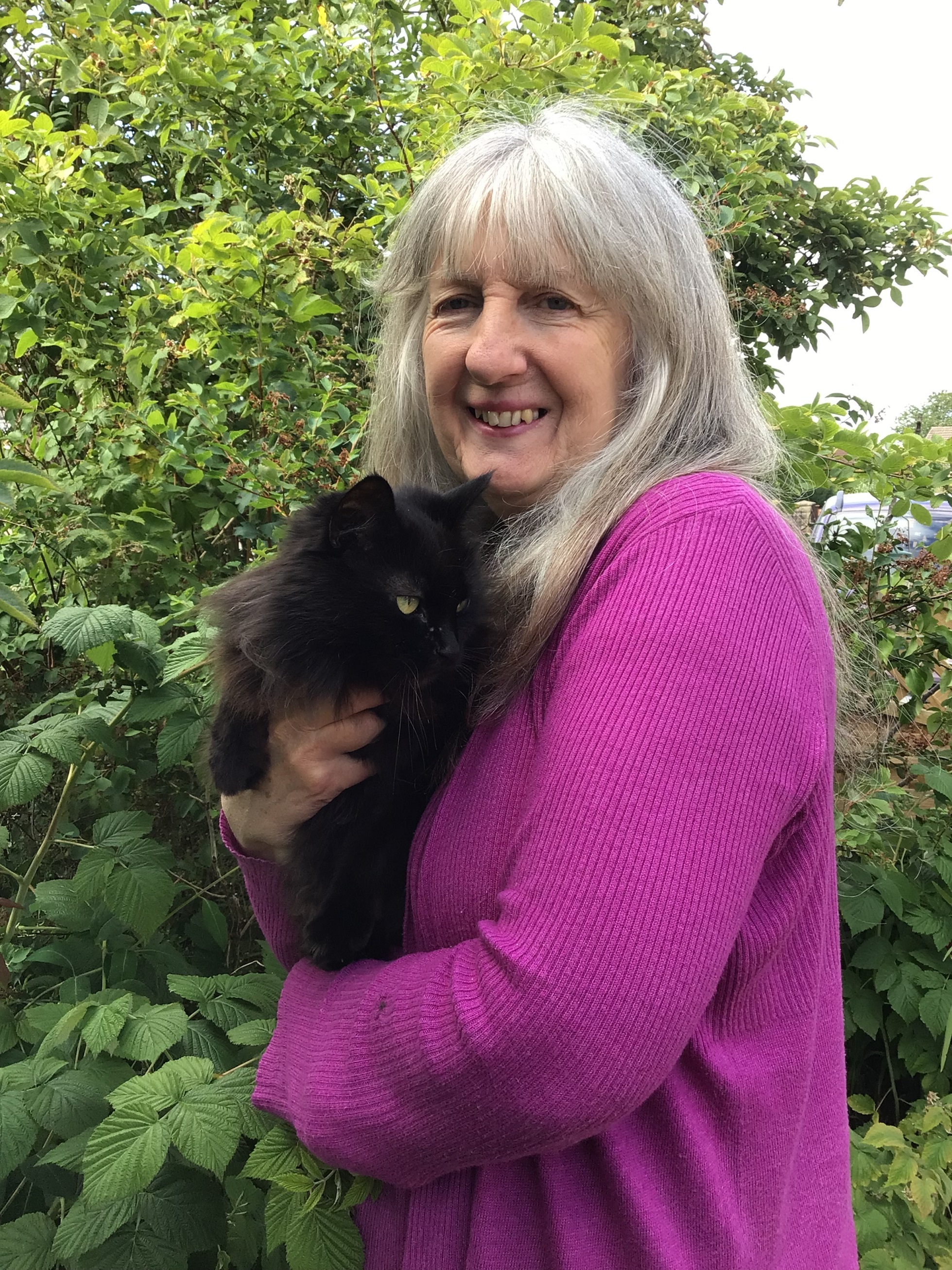 Volunteer at St Helen’s, Diane Jennings with her beloved pet cat Poppy