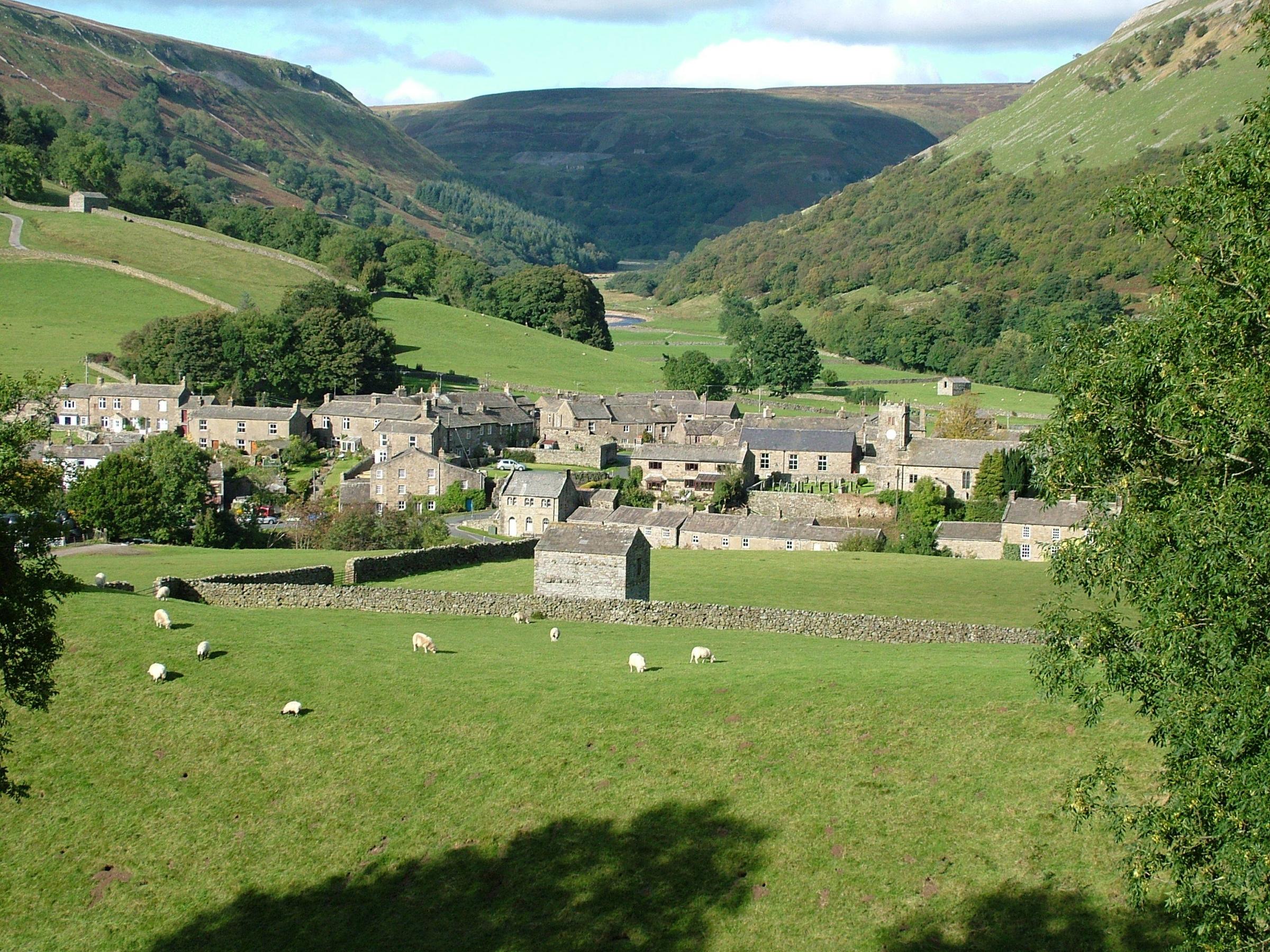 Muker, nestled at the foot of the Buttertubs Pass