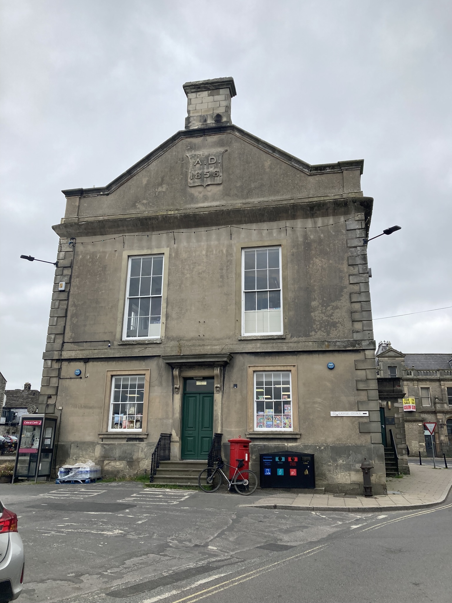 Leyburn Town Hall, with the lions head fountain bottom right