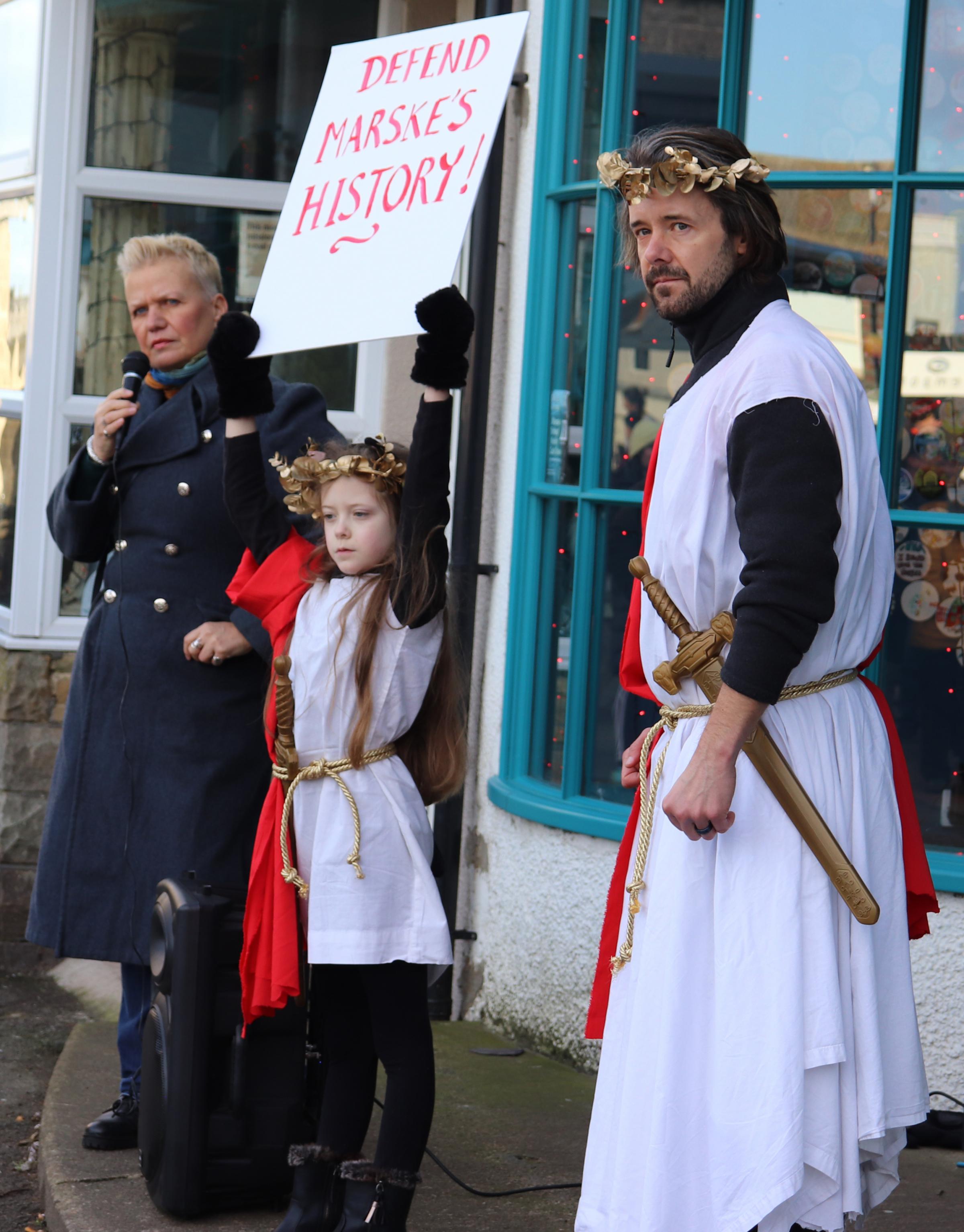 Councillor Dr Tristan Learoyd, right, in Roman garb during the protest with his daughter Asta. Picture: Peter Downham